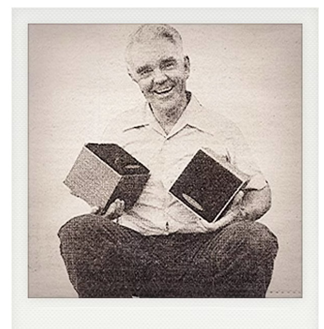 Jack Wilson holding Auratone 5C speakers